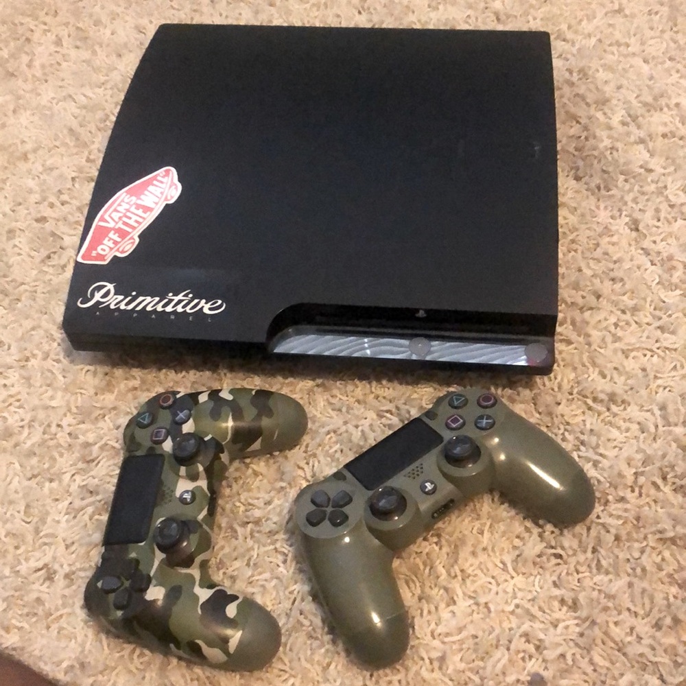 PS3 with two controllers.